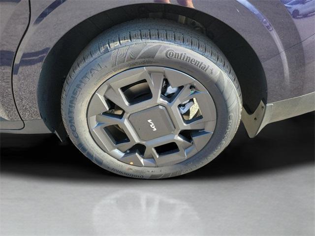 Photo of 2026 Deep Chroma Blue Kia Carnival Hybrid
