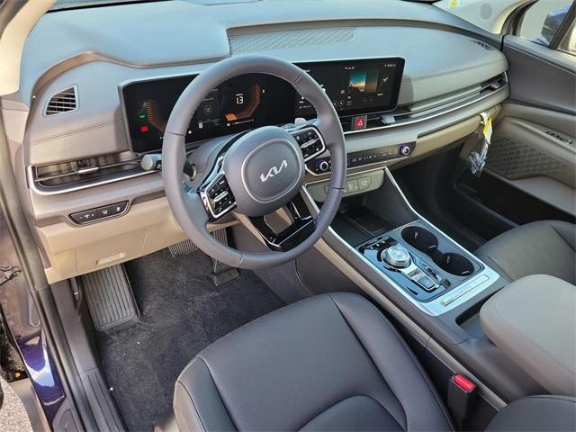 Photo of 2026 Deep Chroma Blue Kia Carnival Hybrid