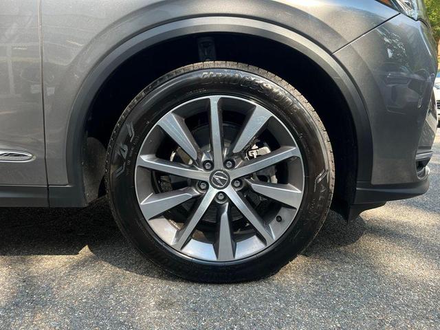 Photo of 2025 Liquid Carbon Metallic Acura MDX