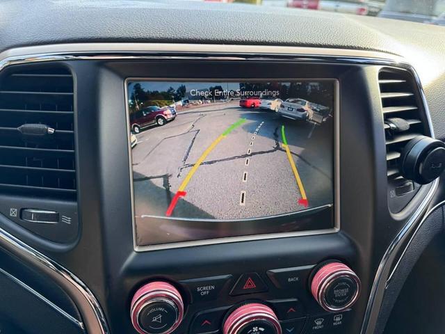 Photo of 2015 Burgundy Jeep Grand Cherokee
