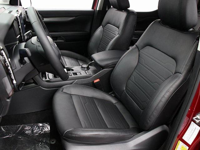 Photo of 2025 Ruby Red Metallic Tinted Clearcoat Ford Ranger