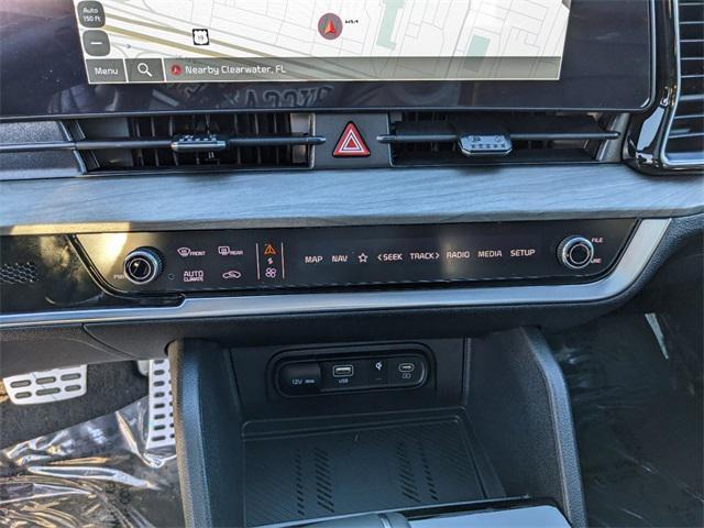 Photo of 2025 Wolf Gray/Ebony Black Roof Kia Sportage