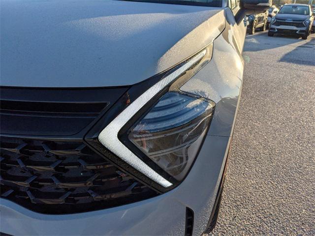 Photo of 2025 Wolf Gray/Ebony Black Roof Kia Sportage