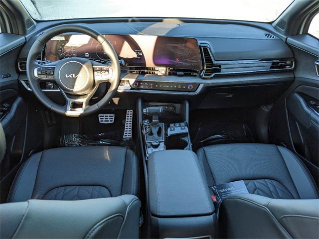 Photo of 2025 Wolf Gray/Ebony Black Roof Kia Sportage