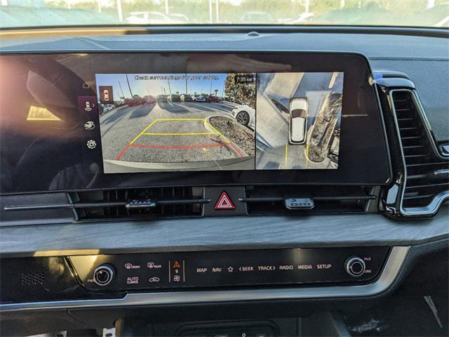 Photo of 2025 Wolf Gray/Ebony Black Roof Kia Sportage