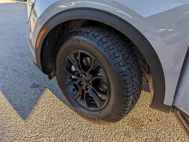 Photo of 2025 Wolf Gray/Ebony Black Roof Kia Sportage