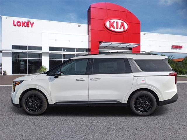 Photo of 2025 Snow White Pearl Kia Carnival Hybrid