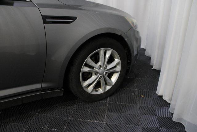 Photo of 2013 Titanium Metallic Kia Optima