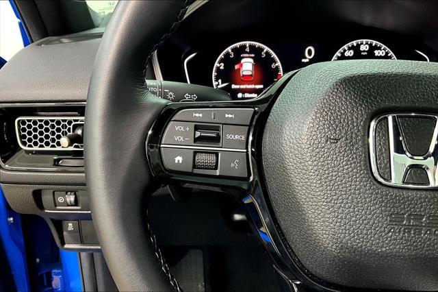Photo of 2025 Blue Lagoon Pearl Honda Civic