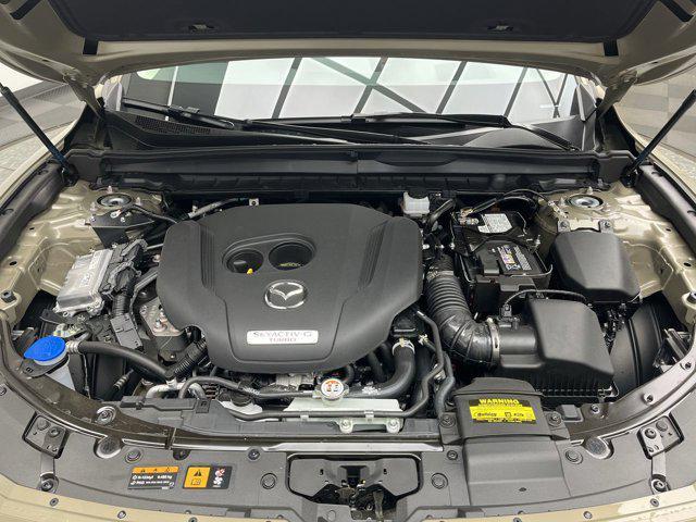 Photo of 2025 Tan Mazda CX-50