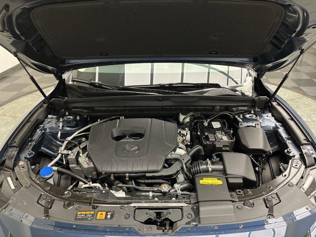 Photo of 2025 Ingot Blue Metallic Mazda CX-50