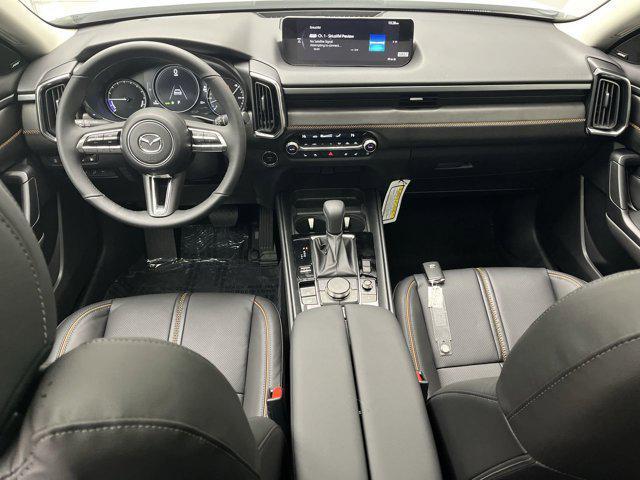 Photo of 2025 Wind Chill Pearl Mazda CX-50 Hybrid