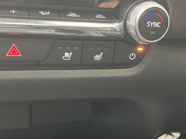 Photo of 2025 Wind Chill Pearl Mazda CX-50 Hybrid