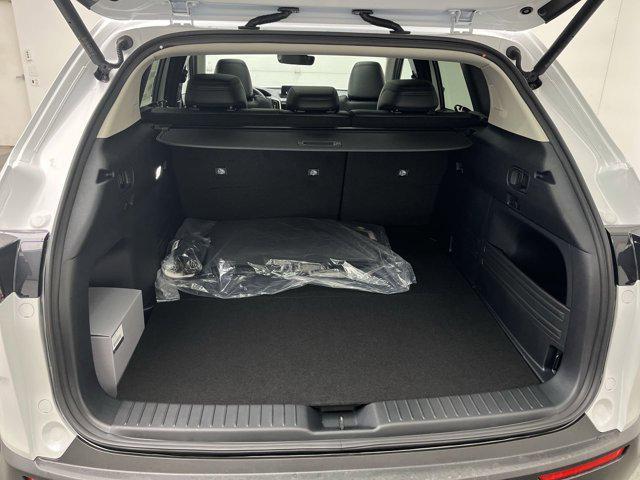 Photo of 2025 Wind Chill Pearl Mazda CX-50 Hybrid