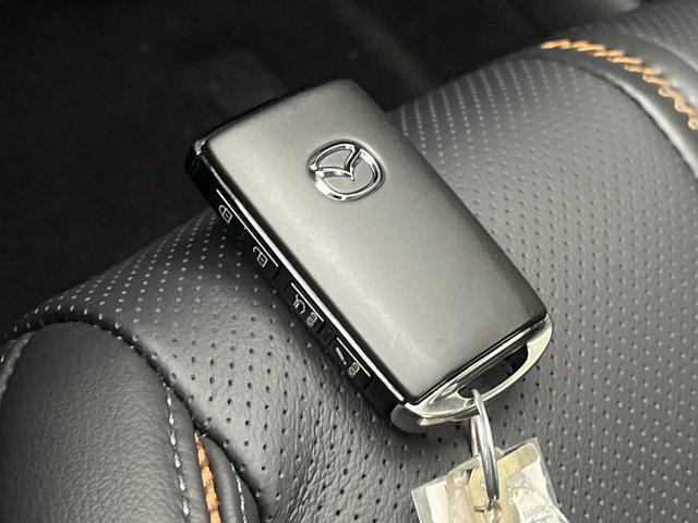 Photo of 2025 Wind Chill Pearl Mazda CX-50 Hybrid