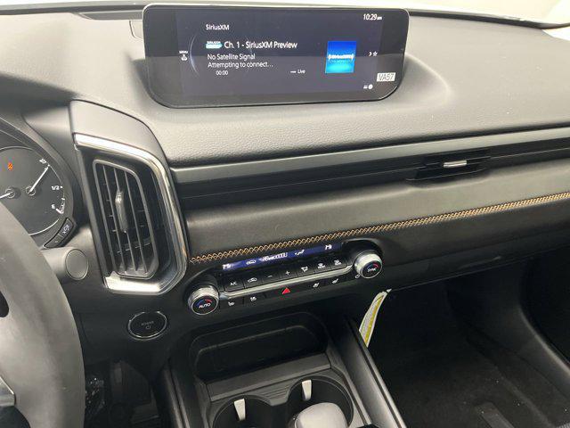 Photo of 2025 Wind Chill Pearl Mazda CX-50 Hybrid