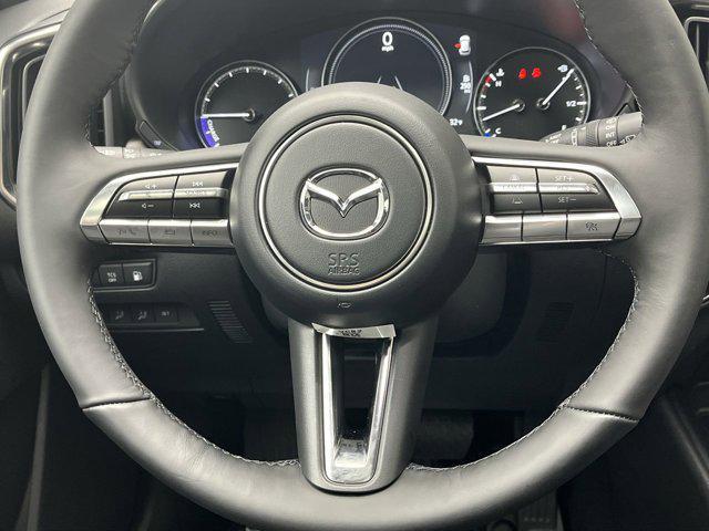Photo of 2025 Wind Chill Pearl Mazda CX-50 Hybrid