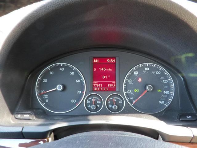 Photo of 2009 Black Uni Volkswagen Eos