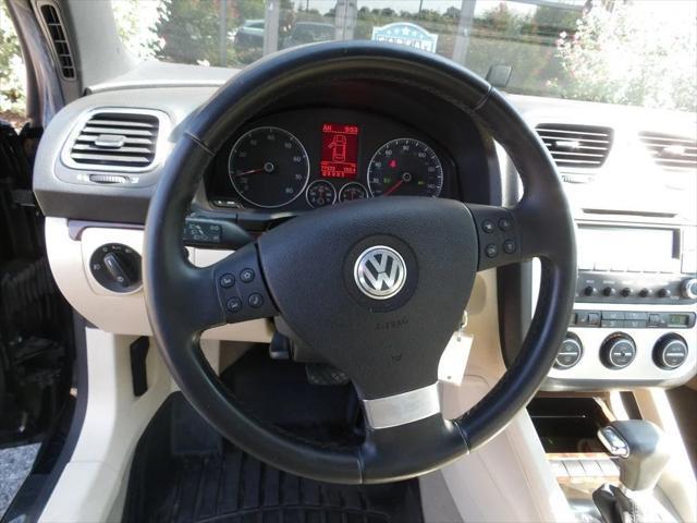 Photo of 2009 Black Uni Volkswagen Eos