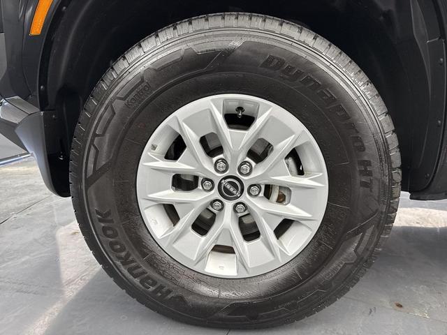 Photo of 2025 Super Black Nissan Frontier