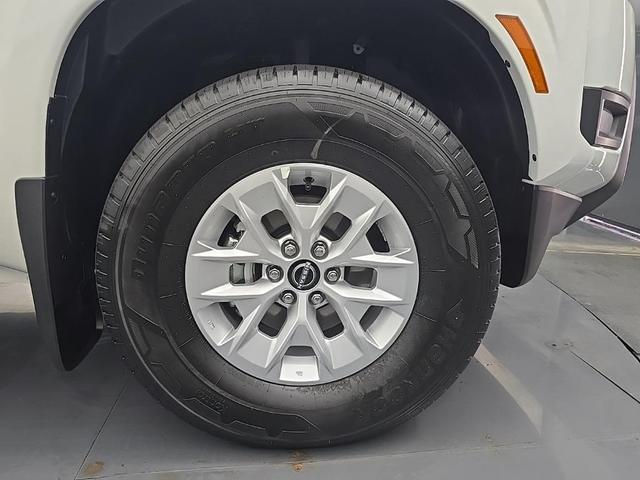 Photo of 2026 Glacier White Nissan Frontier