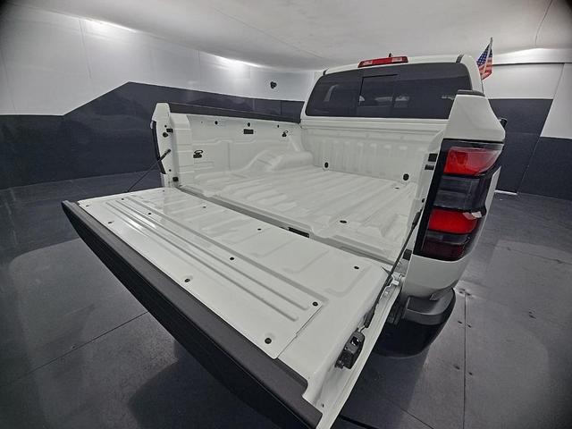 Photo of 2026 Glacier White Nissan Frontier