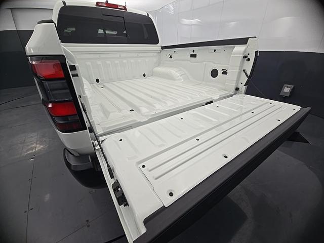 Photo of 2026 Glacier White Nissan Frontier