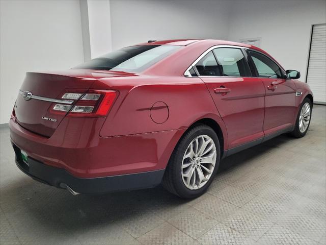 Photo of 2013 Ruby Red Metallic Tinted Clearcoat Ford Taurus