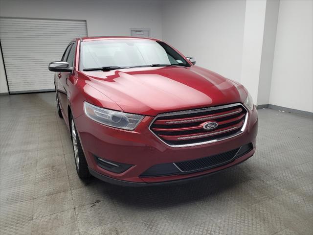 Photo of 2013 Ruby Red Metallic Tinted Clearcoat Ford Taurus