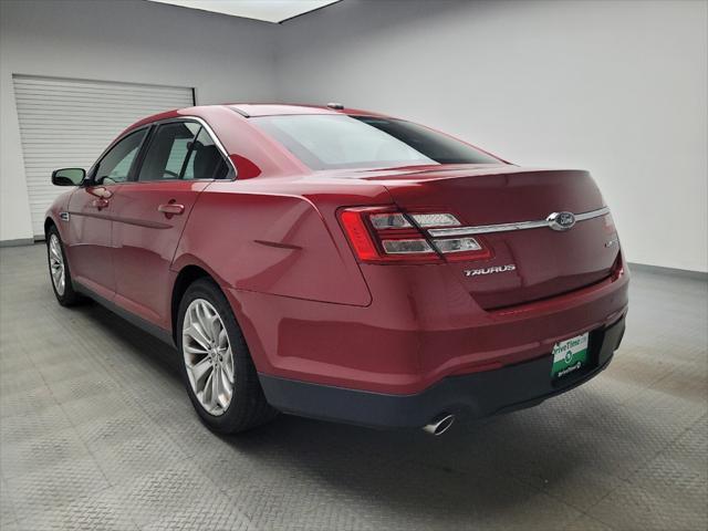 Photo of 2013 Ruby Red Metallic Tinted Clearcoat Ford Taurus