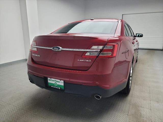 Photo of 2013 Ruby Red Metallic Tinted Clearcoat Ford Taurus