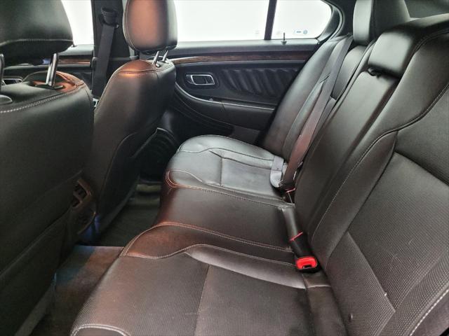 Photo of 2013 Ruby Red Metallic Tinted Clearcoat Ford Taurus