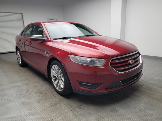 Photo of 2013 Ruby Red Metallic Tinted Clearcoat Ford Taurus