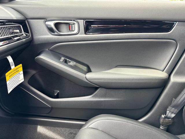 Photo of 2026 Platinum White Pearl Honda Civic Hybrid