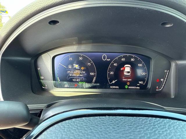 Photo of 2026 Solar Silver Metallic Honda Civic Hybrid