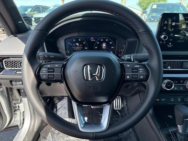 Photo of 2026 Solar Silver Metallic Honda Civic Hybrid
