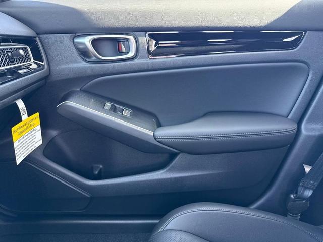 Photo of 2026 Solar Silver Metallic Honda Civic Hybrid