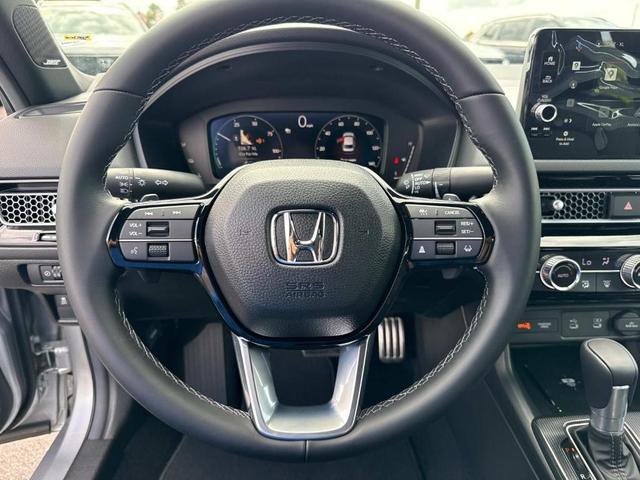 Photo of 2025 Solar Silver Metallic Honda Civic Hybrid