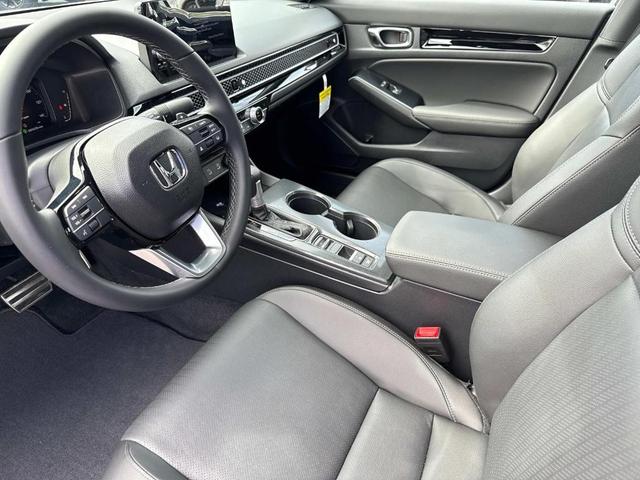 Photo of 2025 Solar Silver Metallic Honda Civic Hybrid