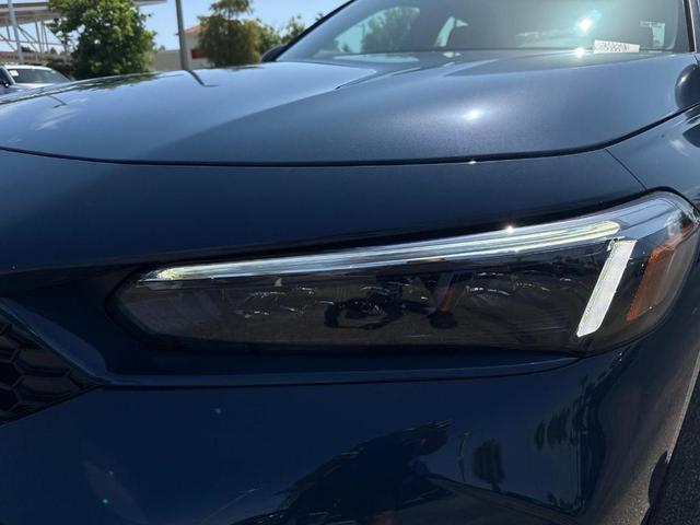 Photo of 2026 Blue Lagoon Honda Civic Hybrid