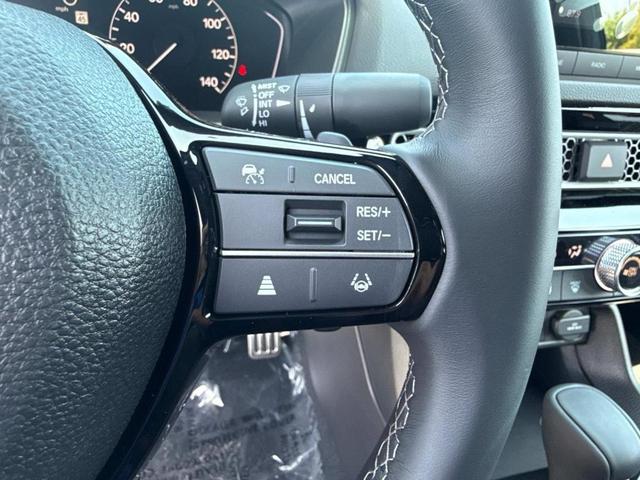 Photo of 2026 Blue Lagoon Honda Civic Hybrid