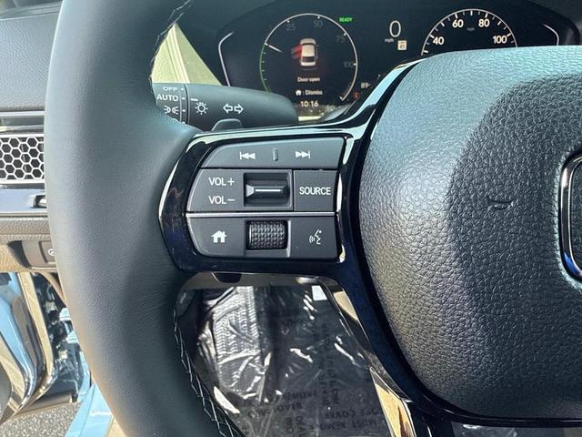 Photo of 2026 Blue Lagoon Honda Civic Hybrid