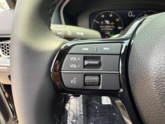 Photo of 2025 Crystal Black Pearl Honda Civic Hybrid