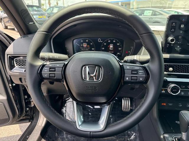 Photo of 2025 Crystal Black Pearl Honda Civic Hybrid