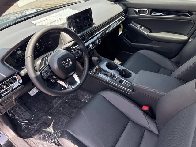 Photo of 2025 Crystal Black Pearl Honda Civic Hybrid