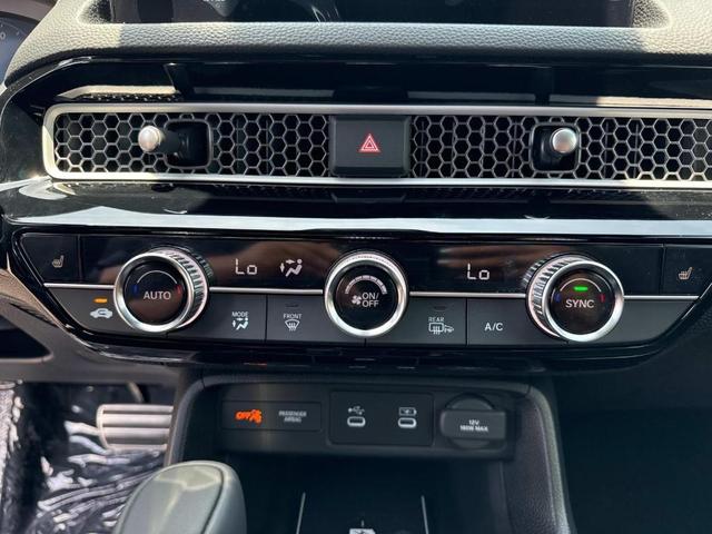 Photo of 2025 Crystal Black Pearl Honda Civic Hybrid