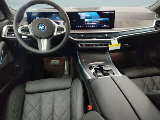Photo of 2026 Skyscraper Grey Metallic BMW X5 PHEV