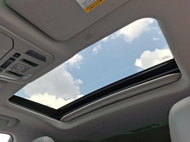 Photo of 2021 Opulent Amber Toyota Highlander Hybrid