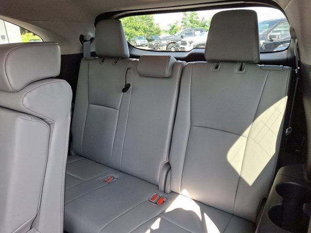 Photo of 2021 Opulent Amber Toyota Highlander Hybrid