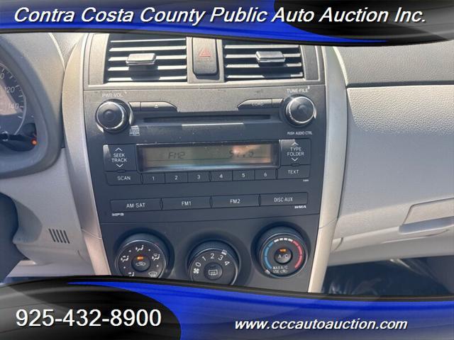 Photo of 2010 Classic Silver Metallic Toyota Corolla